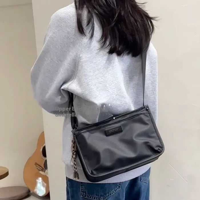 Oxford cloth crossbody bag in cool colour with street trend style and square shape
