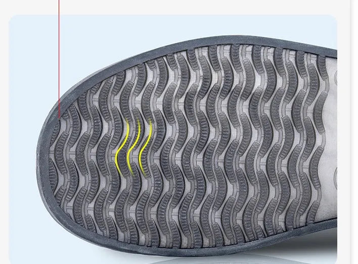 White PVC high-top reusable shoe covers for women, shown on feet.
