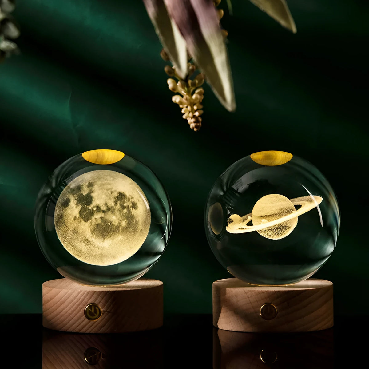 Transparent crystal ball with 3D laser inner carving of a galaxy on a beech wood base with warm light
