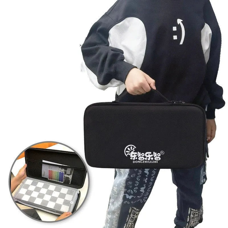 Portable folding ABS chessboard in 32cm size on a table