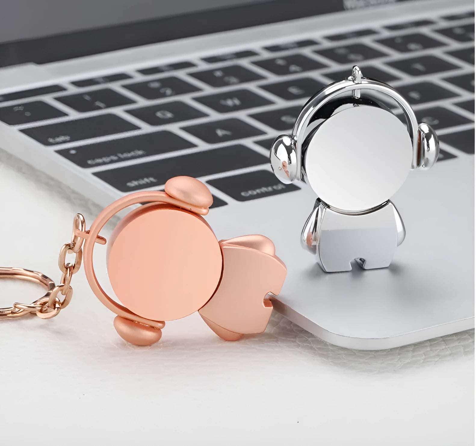 Silver metal USB flash drive with musician cartoon design showing compact dimensions