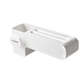 White plastic knife rack on kitchen countertop showing modern simple design