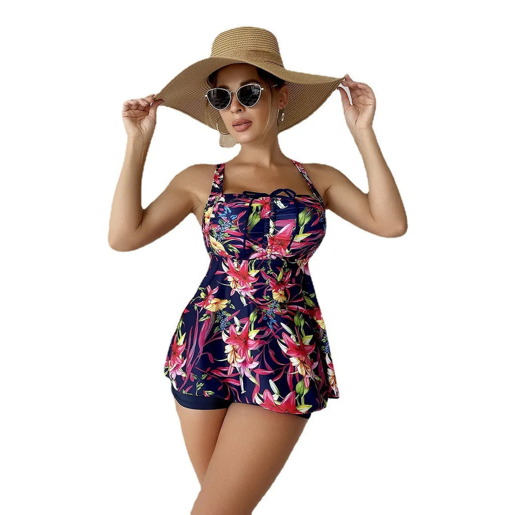 Women's high-waist skirt-style swimsuit briefs in a red floral pattern.