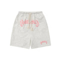 Man's loose-fit cotton-blend shorts in black, shown in a casual streetwear style.
