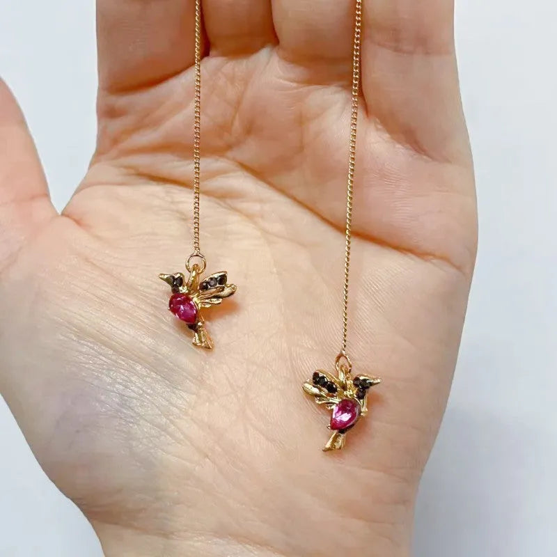 Long drop bird earrings for women with zirconium wings in blue, red, or red lvzuan colours.