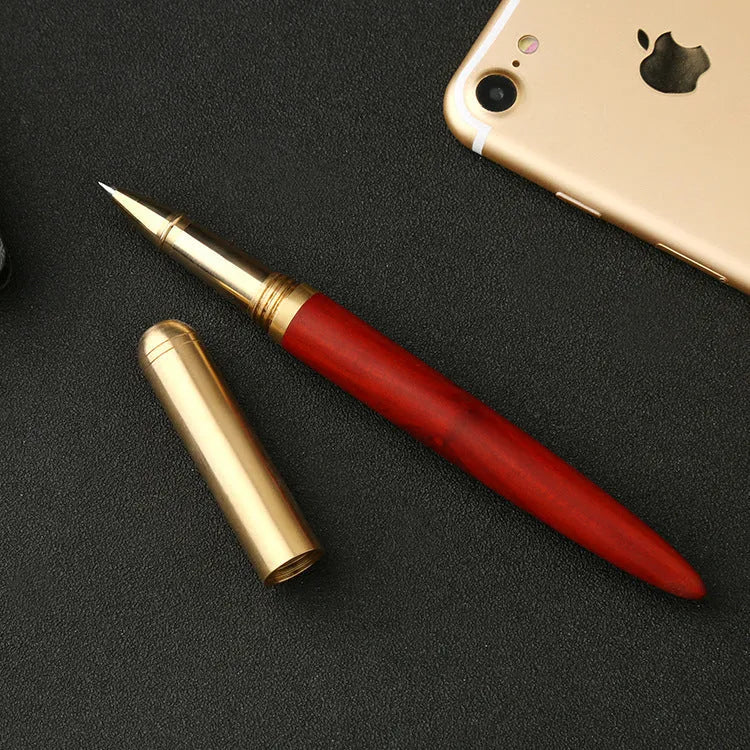 Solid wood and brass signature pen showing choice of ebony, rosewood, sandalwood, tiger skin wood, and wingwood finishes.