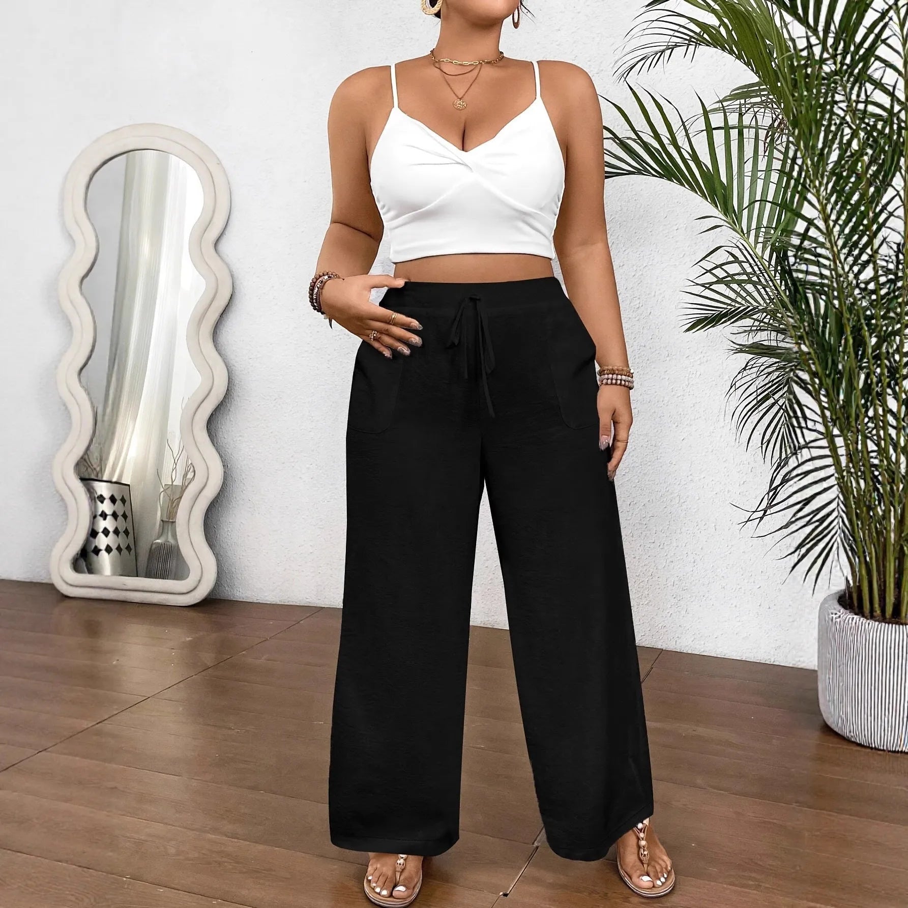 Women's drawstring wide leg polyester trousers in khaki with side pockets and loose fit