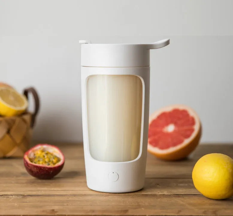 Portable USB rechargeable blender cup in blue colour showing cup and motor lid