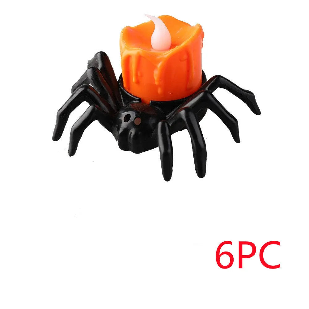 Halloween spider candlestick ornament with plastic construction and battery-powered lighting
