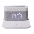 Black or white table lamp with wireless phone charging pad and digital clock display