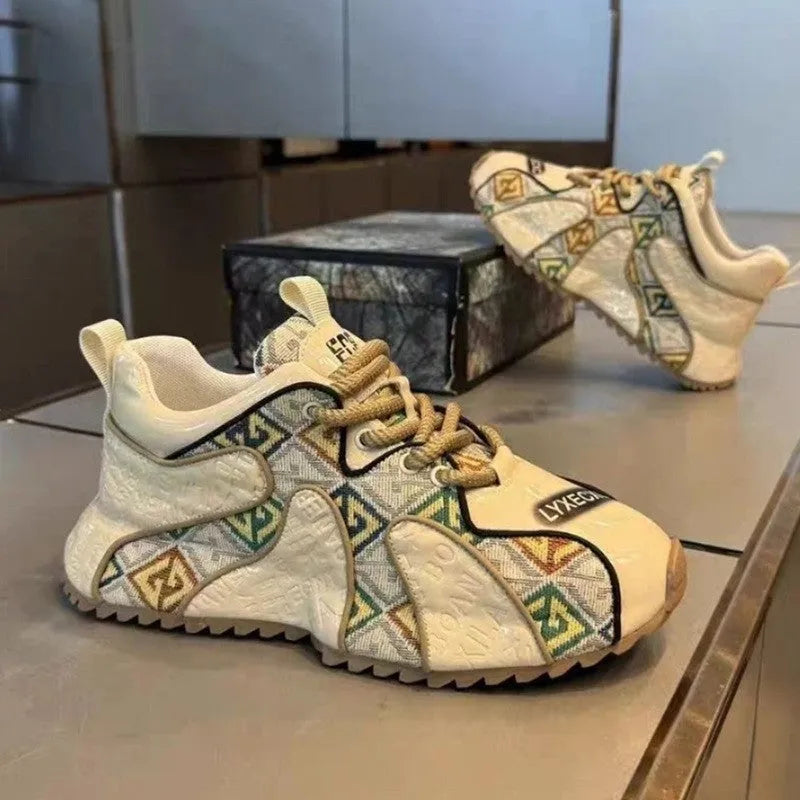 Men's beige casual low-top pumps with embroidery stitching on the artificial PU upper and a thick rubber platform sole.