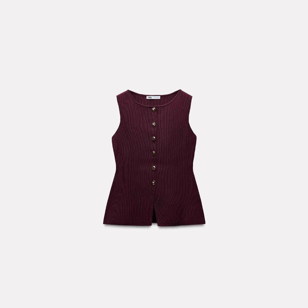 Dark red slim-fit sleeveless cardigan vest with a raised 3D pattern texture on a mannequin.