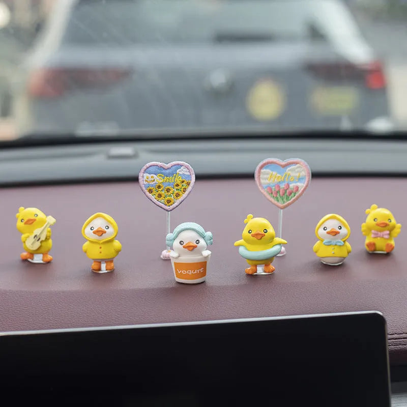 PVC cartoon duckling car decoration set with six small ducks and a hello sign