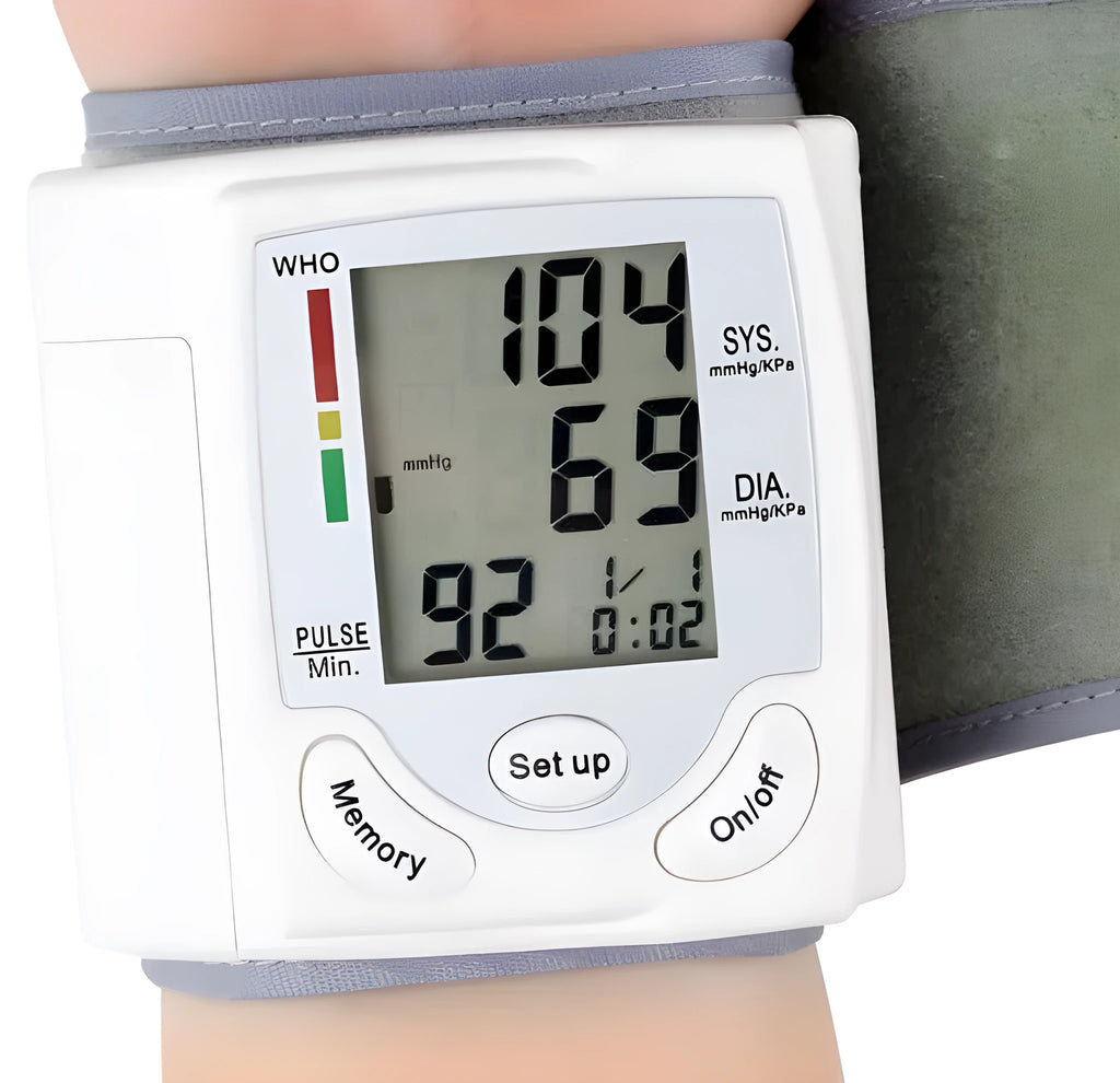Grey wrist blood pressure monitor with compact rectangular design and display screen