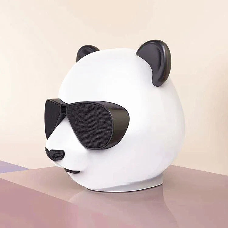 Classic style portable mini Bluetooth speaker showing USB charging port.