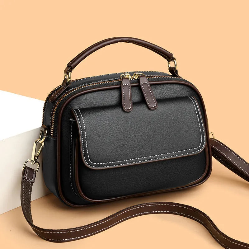 Women's cross-body shoulder bag with double adjustable straps in horizontal square design