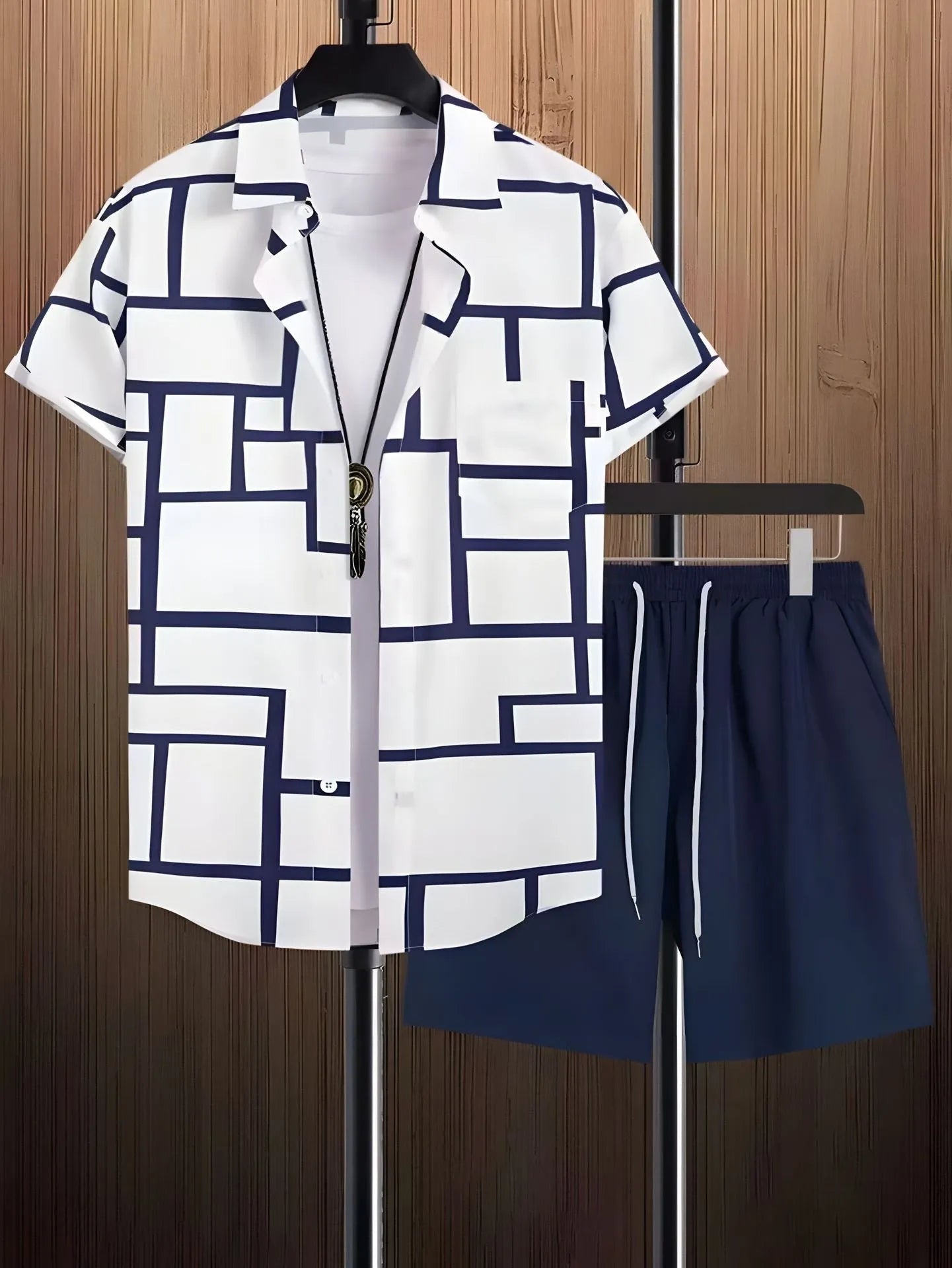 Black and white striped Hawaiian men's pullover shirt and shorts set on a model, loose fit, short sleeves.