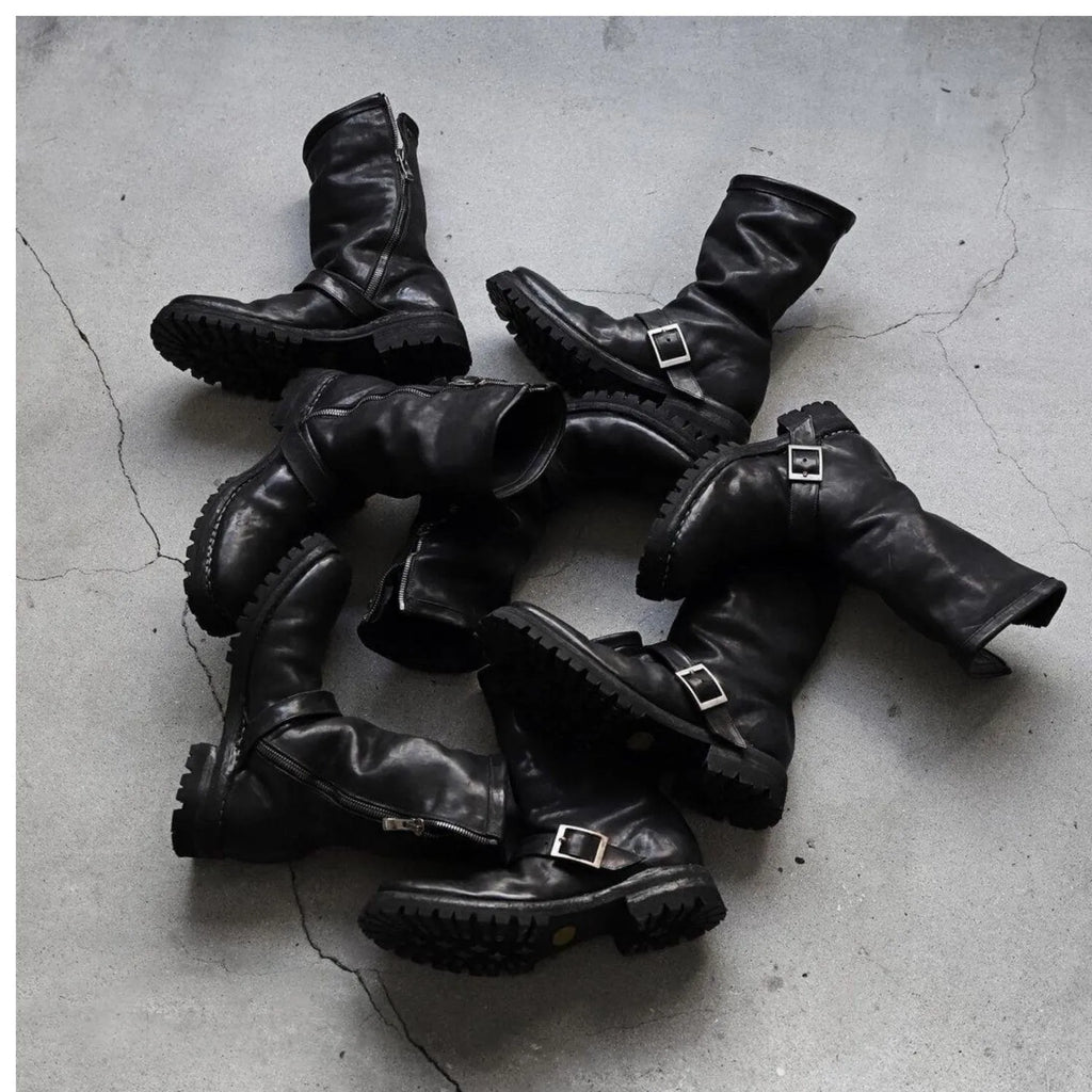 Men's dark retro ankle boots with a side zipper, shown in black.