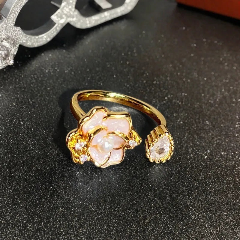 Adjustable copper ring with New Chinese style gourd, flower, and bow design in a vintage oil drip pattern.