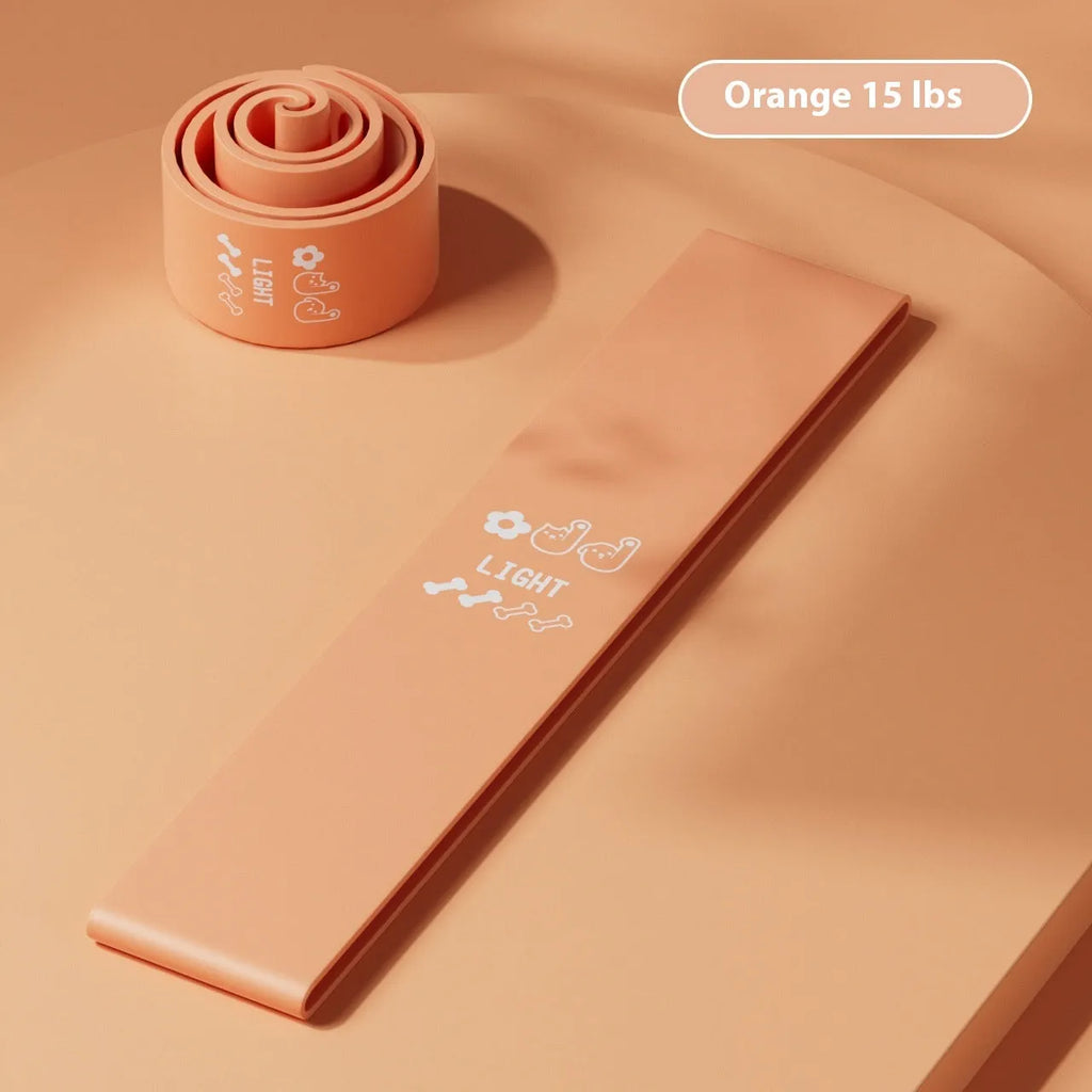Four plastic resistance bands in pink, orange, beige and green colours showing different tension levels