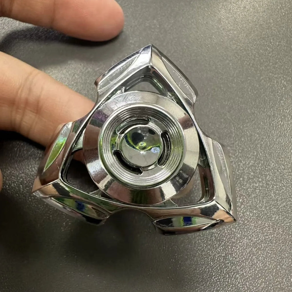 Silver and colourful alloy fingertip gyro decompression fidget toy.