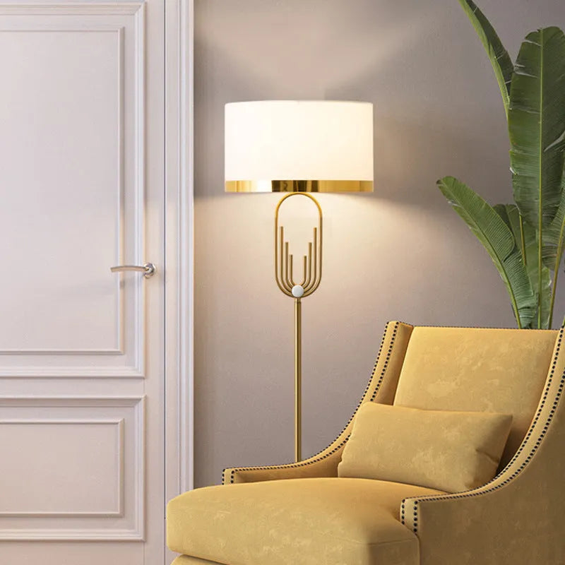 Modern vertical fabric floor lamp with adjustable height and remote control, 165cm tall, next to a desk