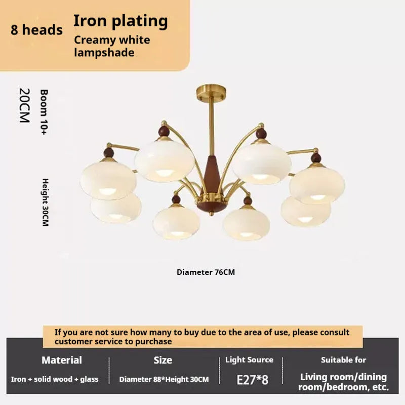 American retro persimmon chandelier with amber yellow glass shades in a dining room setting