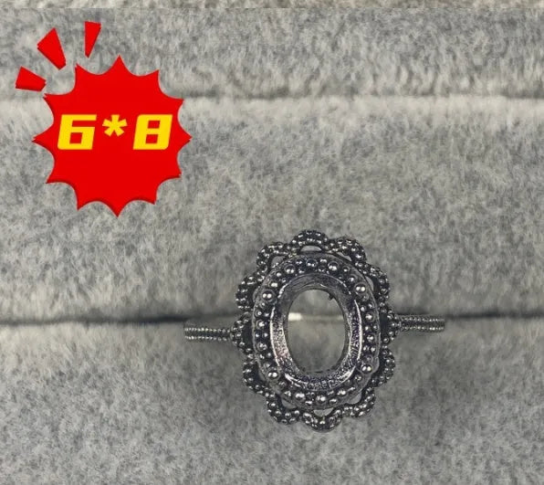Oval denier ring with open mouth design, 6*8mm stone, and five-pointed star decoration