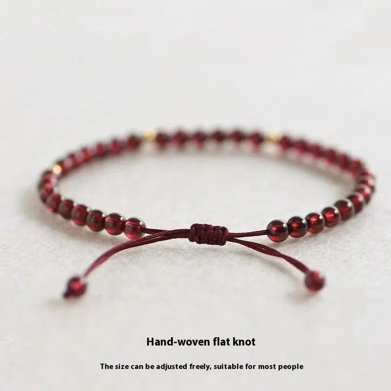 Hand-woven garnet Chinese bracelet with flexible wire red rope design