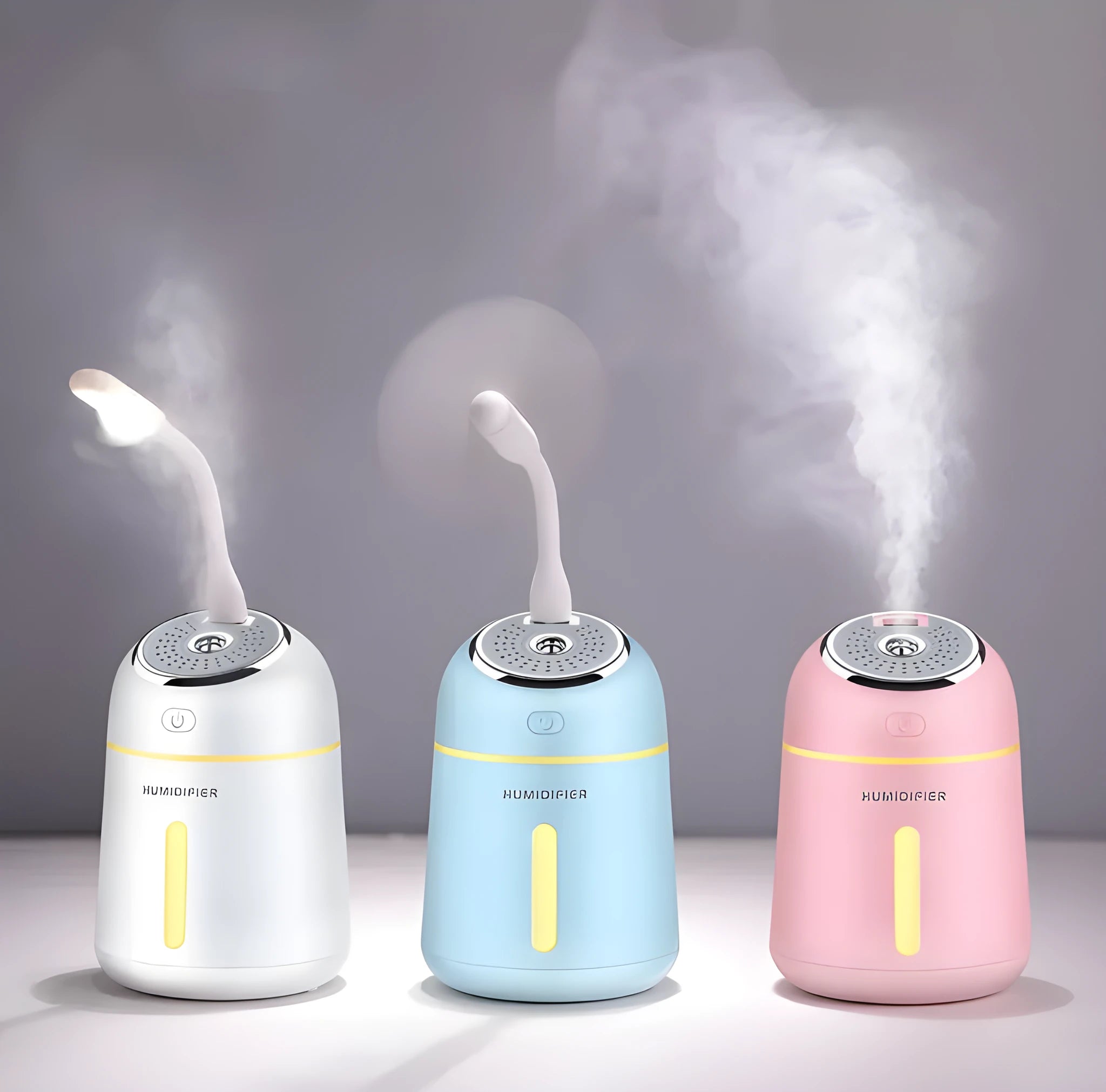 Mini ultrasonic USB humidifier 330ml in blue on desk with fan and LED light