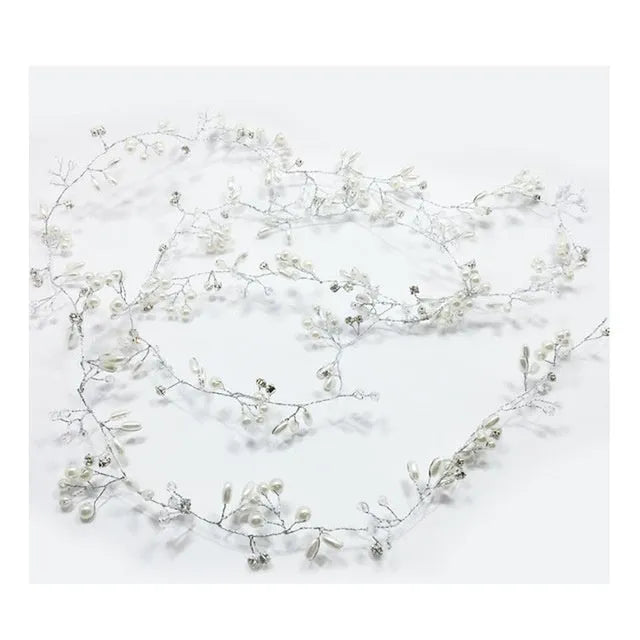 Silver bride's long hair band with crystals and pearls for wedding updos.