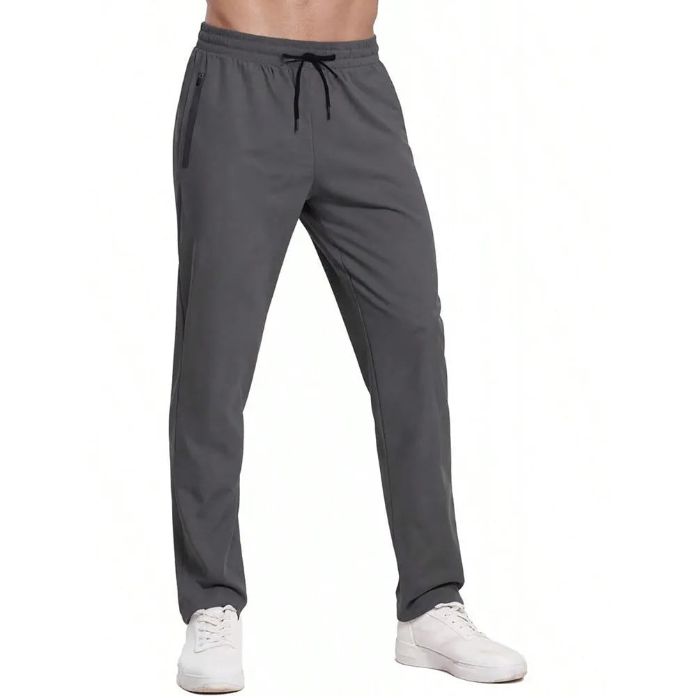 Men's loose lace-up elastic waist casual pants in polyester, available in multiple colours including black and blue
