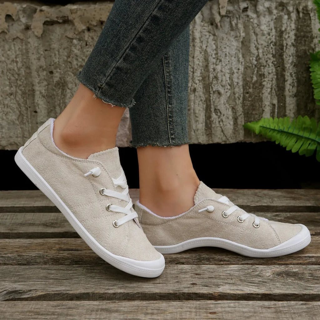 Women's creamy white low-top fabric casual sneakers with rubber sole