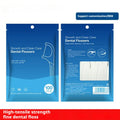 Portable bag containing 100 independently packaged plastic dental floss threads.