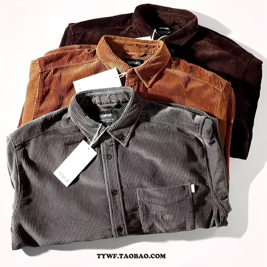 Caramel and grey loose fit long sleeve corduroy cardigan shirt on a hanger.