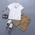 Anchor printed cotton trousers suit set for infants in blue, with short sleeves and pullover closure.
