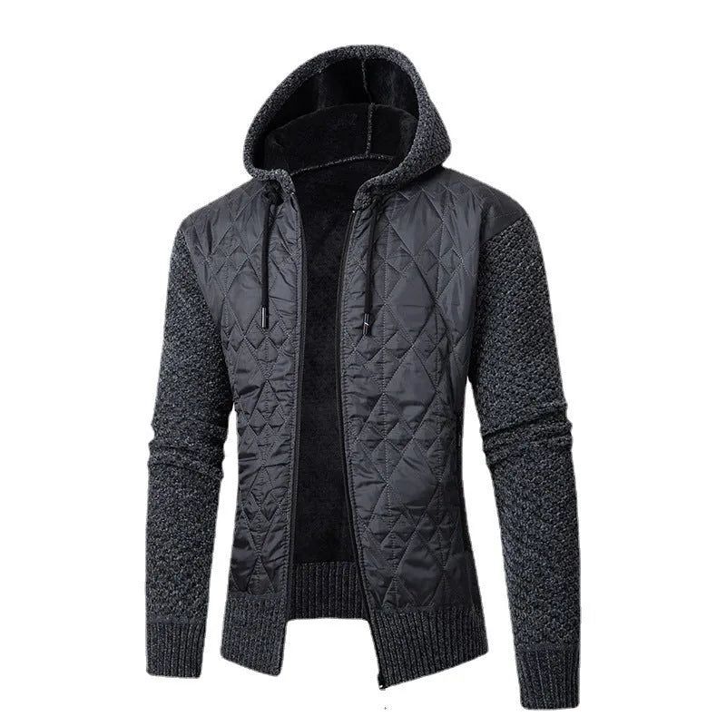 Man wearing a grey hooded corduroy sweater coat with a cinched waist.