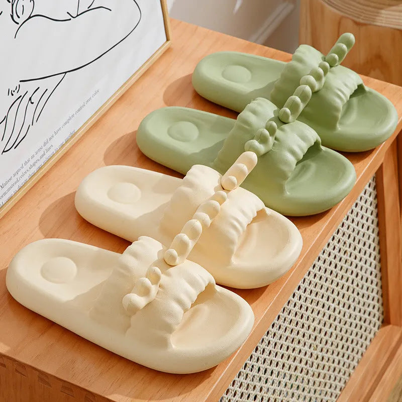 Deer horn patterned EVA flip flops for couples on a white background.