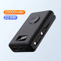 Black and white magnetic wireless power bank with digital display showing battery percentage