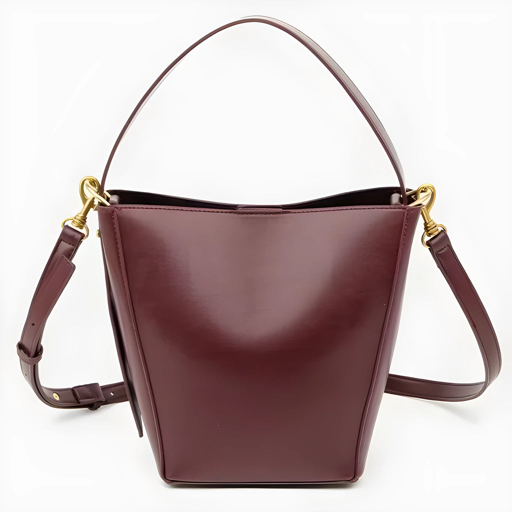 Urban minimalist bucket crossbody bag in army green with front three-dimensional pocket and adjustable strap