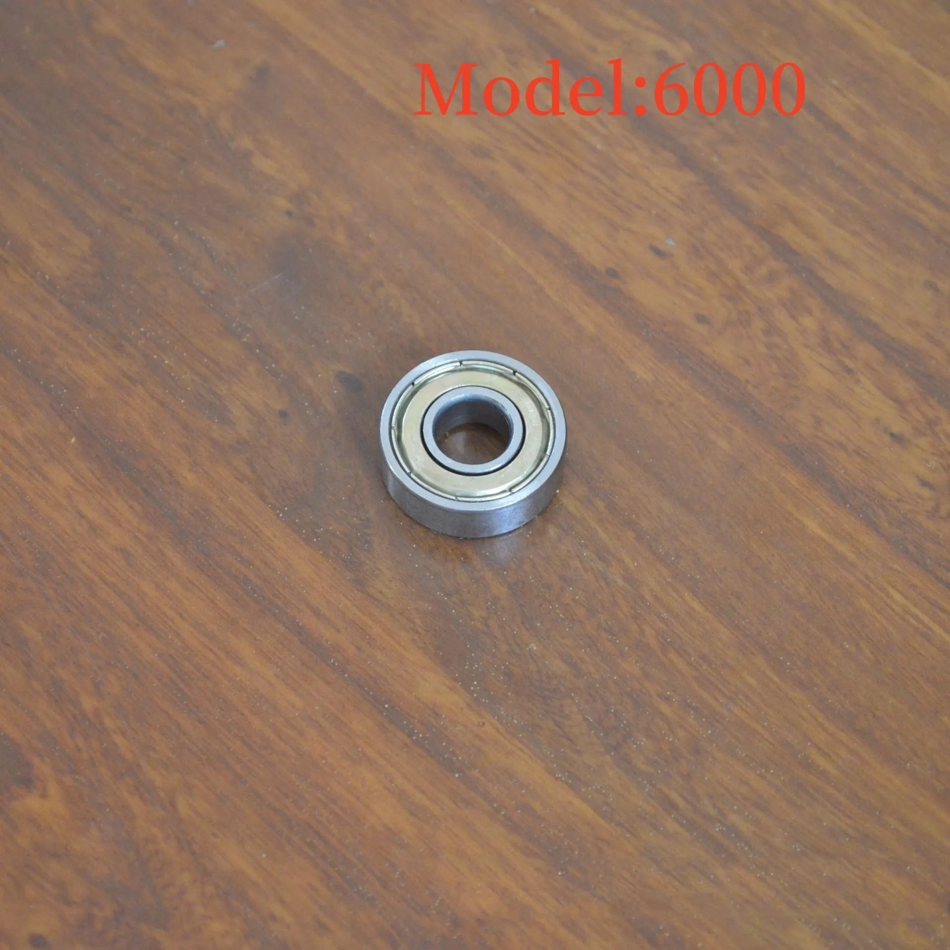 6000ZZ carbon steel deep groove ball bearing with metal shields, dimensions 10mm inner diameter by 26mm outer diameter.
