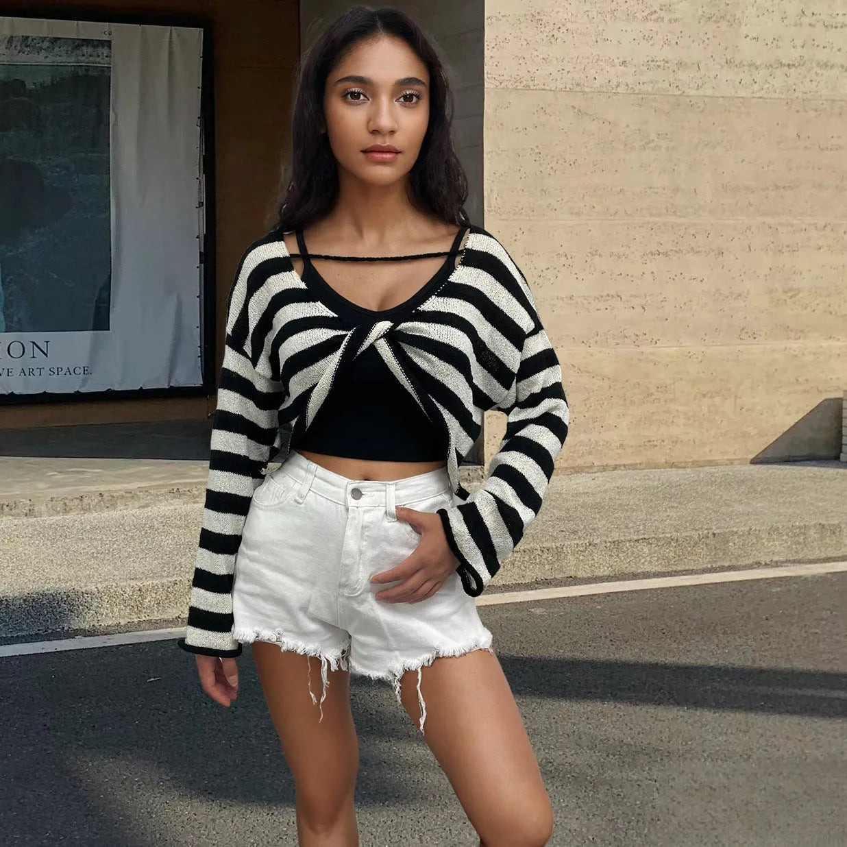 Striped long-sleeved pullover sweater with exposed navel styling in mercerised cotton