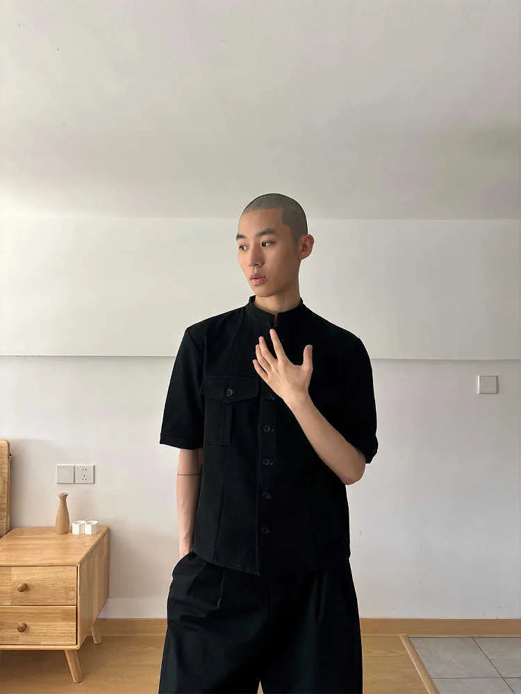 Black handmade men's loose fit half sleeve shirt with a shirt collar.