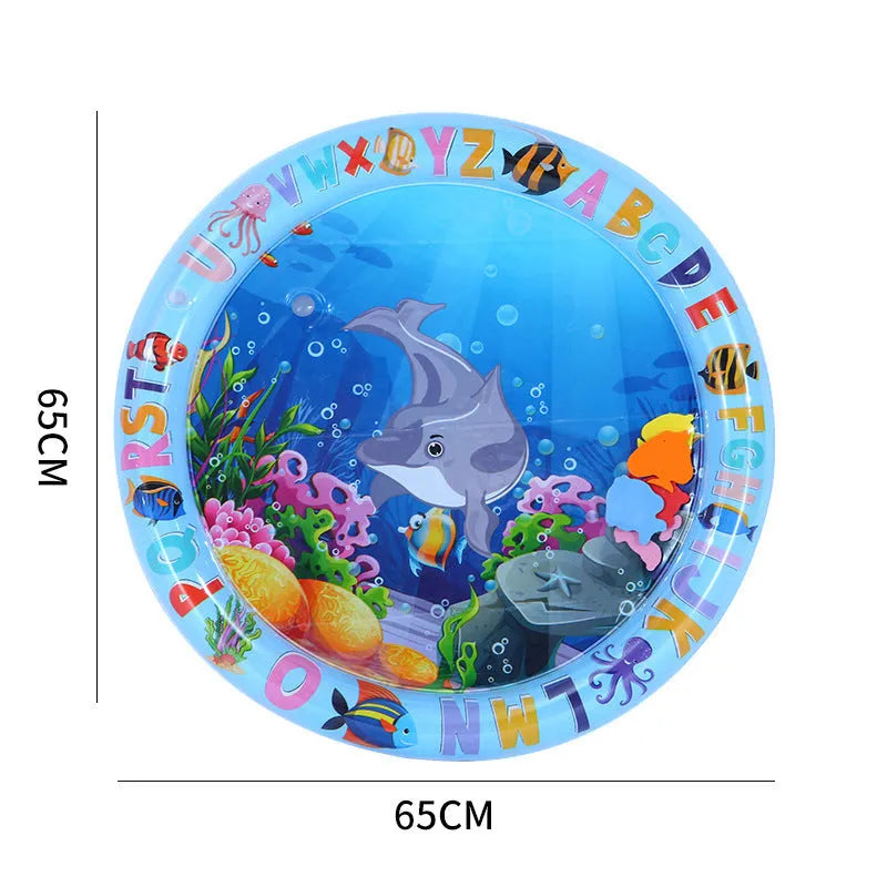 A square blue water sensory playmat for cats on a floor, showing floating fish toys inside the transparent PVC cushion.