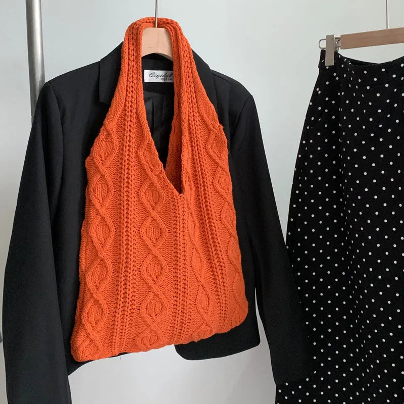 Large retro hollow knitted women's shoulder tote bag in a solid colour with double straps.