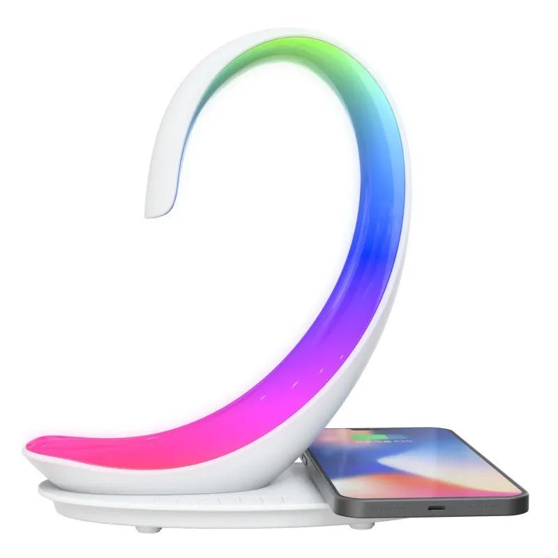 White swan shaped desk lamp with wireless charging pad, Bluetooth speaker and colourful LED lighting