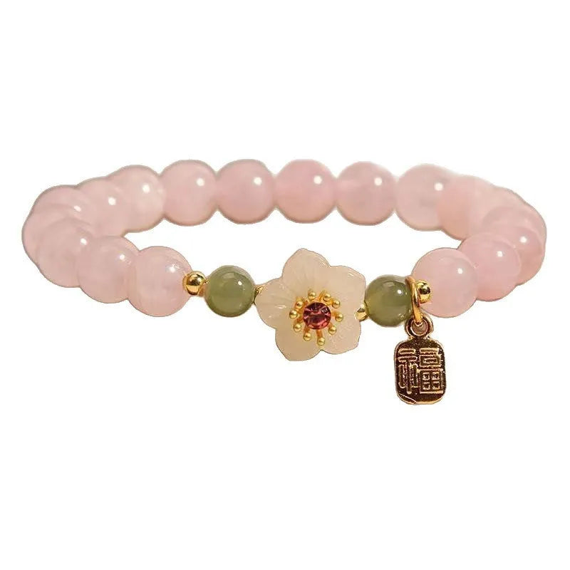 Crystal bracelet with peach blossom charms and polished Hetian jade beads in blessing card colours