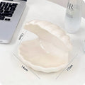 A white porcelain tray with a matching small night light, in pink or white, for a girl's bedroom.