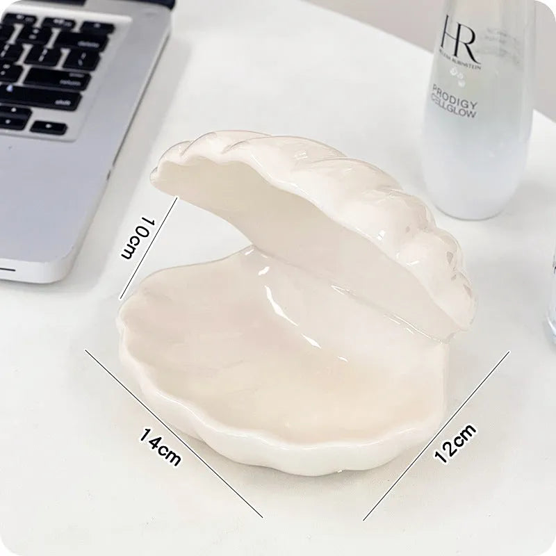 A white porcelain tray with a matching small night light, in pink or white, for a girl's bedroom.
