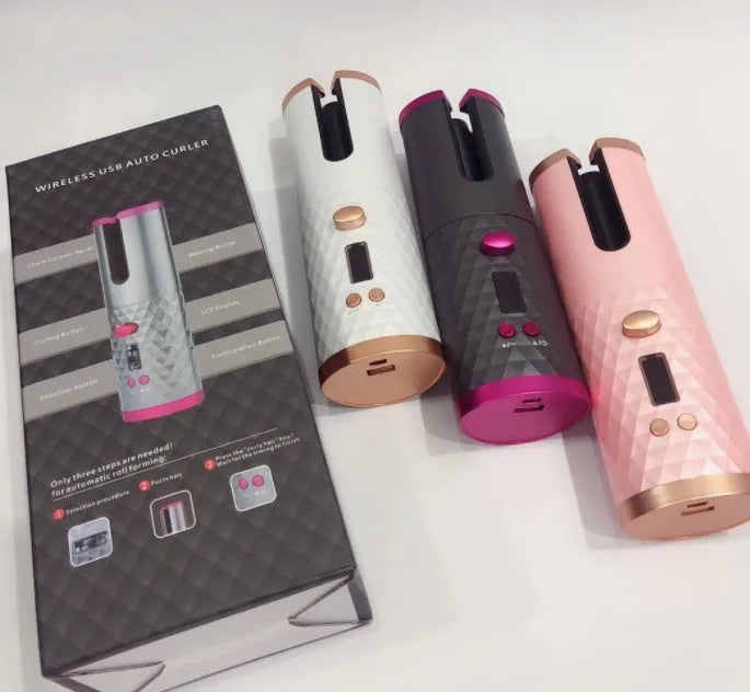 White portable automatic curling iron with USB charging cable and ceramic barrel.